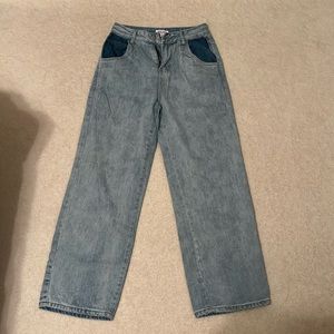 light wash high waisted wide leg jeans with dark pockets